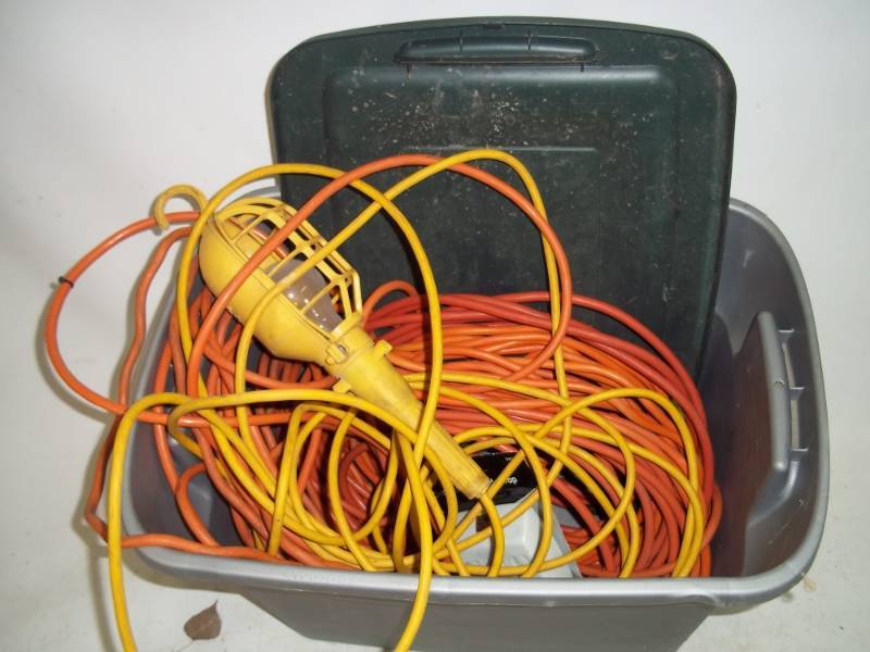 lot 10 image: Tote with Trouble light and Extension Cords
