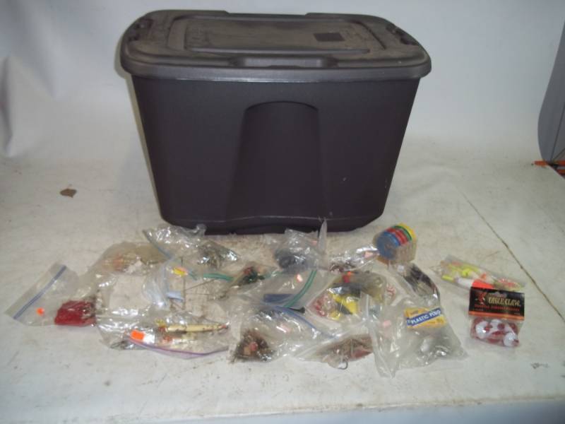 lot 21 image: Assorted Fishing Tackle and supplies with tote