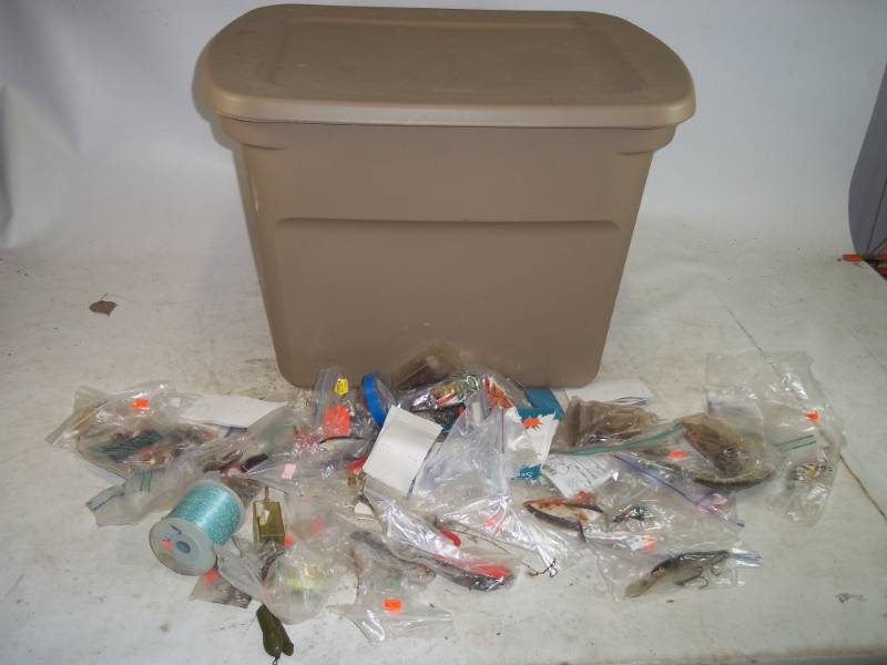 lot 22 image: Assorted Fishing Tackle and supplies with tote