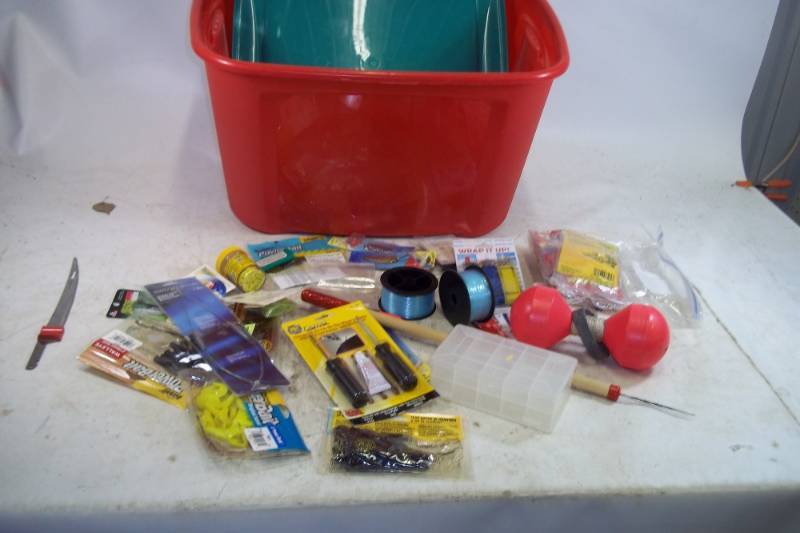 lot 52 image: Assorted Fishing Tackle and supplies with tote