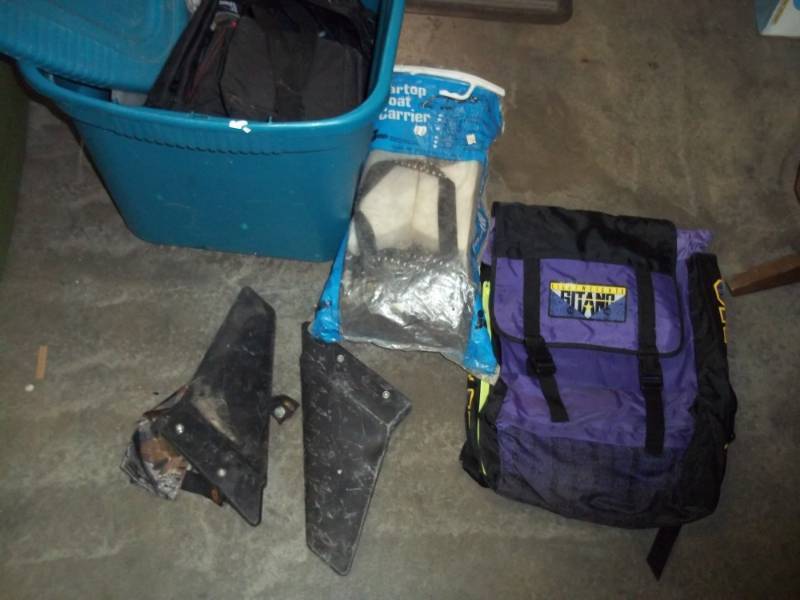 lot 60 image: Tote with Boat car top carrier, backpacks, and bags