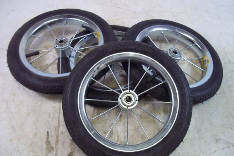 lot 106 image: 4 11 cart wheels