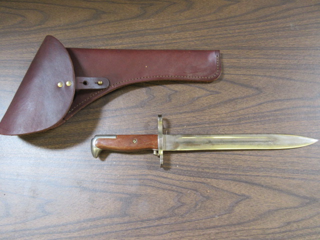 lot 312 image: WOOD AND BRASS BAYONET AND LEATHER LONG BARREL PISTOL HOLSTER