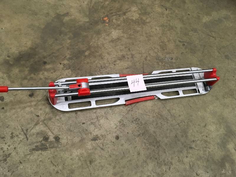 lot 44 image: Rubi Star 24 in. Tile Cutter Not Used