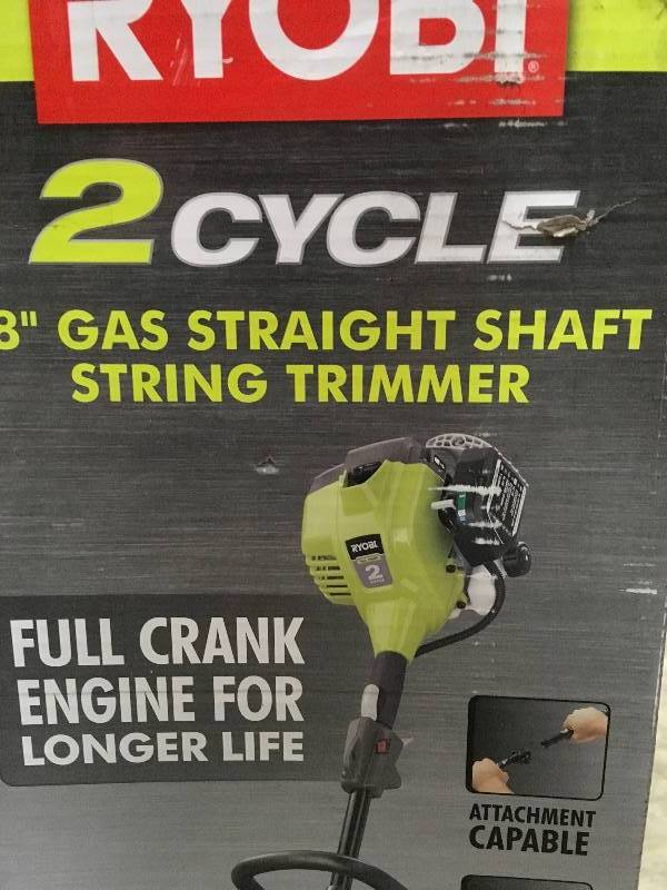 lot 49 image: RYOBI 25 cc 2-Cycle Attachment Capable Full Crank Straight Gas Shaft String Trimmer Not Used