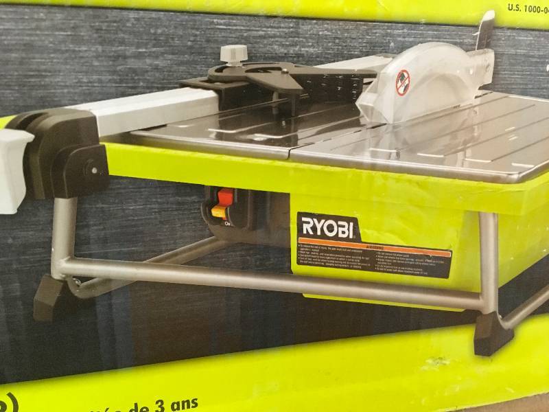 lot 84 image: Ryobi 7 in. 4.8 Amp Tabletop Tile Saw
