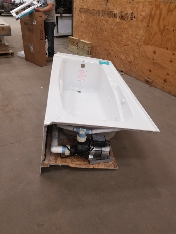 lot 108 image: Colony 66 in. x 32 in. Left Drain Whirlpool Tub with Integral Apron in White open box needs cleaning review pictures retails for $1200