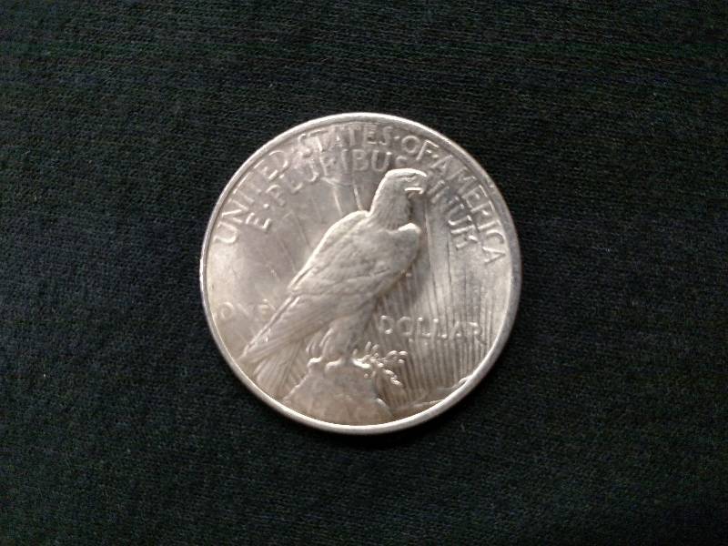 1922 AU Peace Silver Dollar...