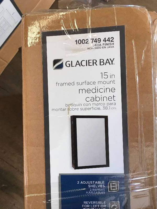 lot 16 image: Glacier Bay 15-14 in. W x 26 in. H Framed Surface-Mount Bathroom Medicine Cabinet in Java  open box not used