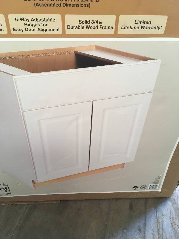 lot 17 image: Hampton Bay Madison Assembled 30x34.5x24 in. Sink Base Cabinet in Warm White Finish