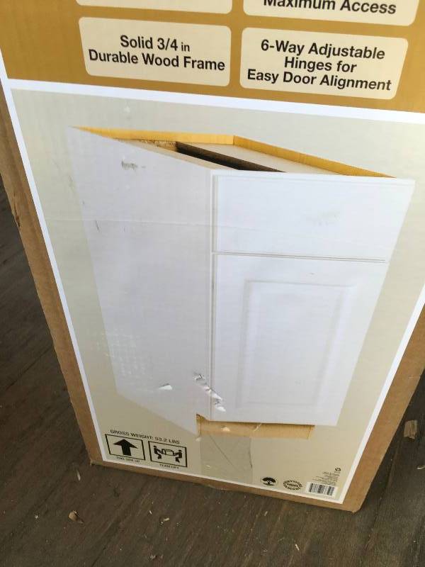 lot 19 image: Hampton Bay Madison 15 In Base Cabinet Warm White Finish 15 in W x 34.5 in x  H 24 in D  open box not used