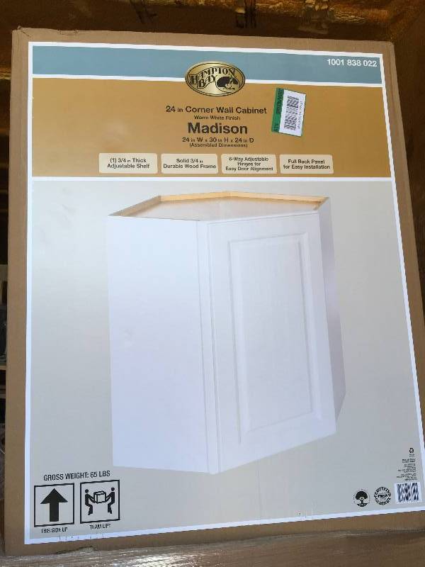lot 20 image: Hampton Bay 24 in Corner Wall Cabinet Warm White Finish Madison