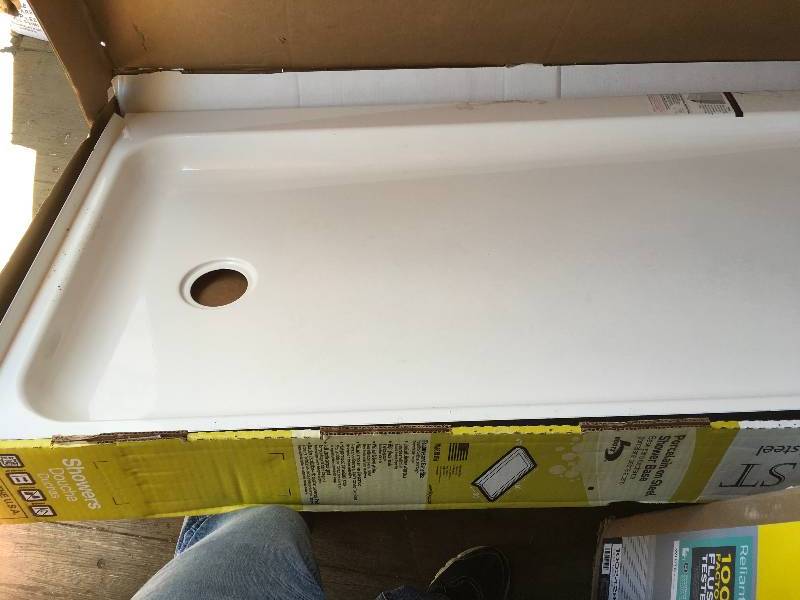 lot 22 image: Showercast White Righ Hand Enameled Steel Shower Pan 60 in x 30 in x 4 in
