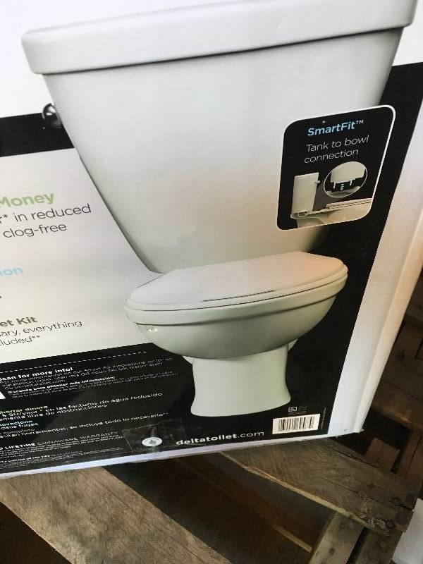 lot 23 image: Delta Prelude Enlogated Bowl White 30 in L x 17 in W x 33 in  H   Complete Toilet Kit  open box not used