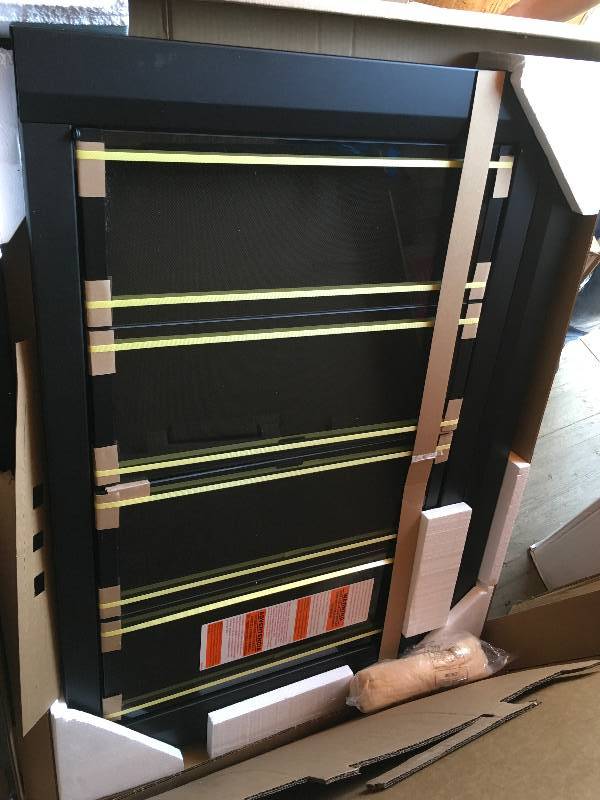 lot 29 image: Templin 30 in. x 34 in. Framed Wall Mirror in Coffee  open box not used
