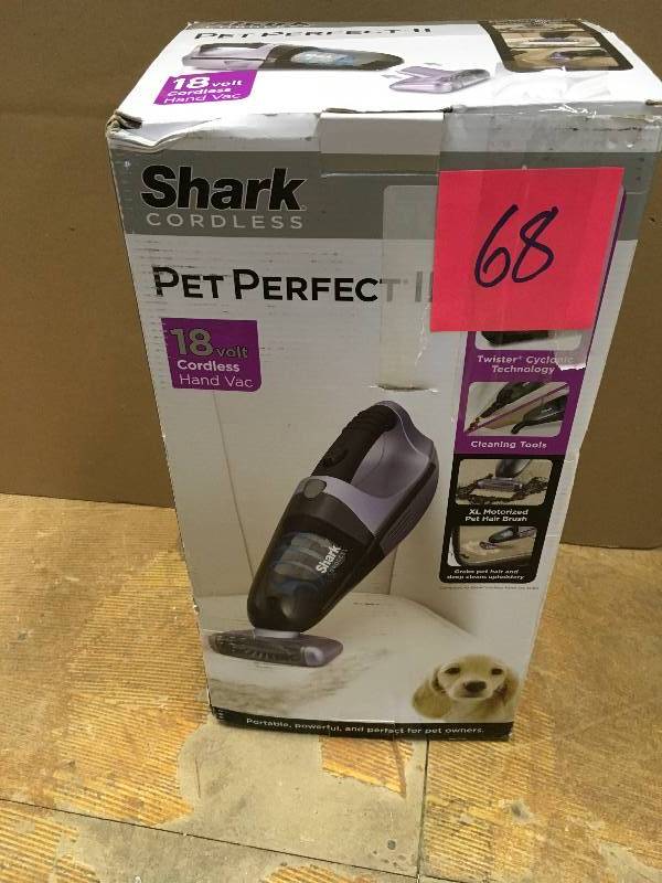 lot 68 image: Shark Pet Perfect II Cordless Handheld Vacuum in working conditions