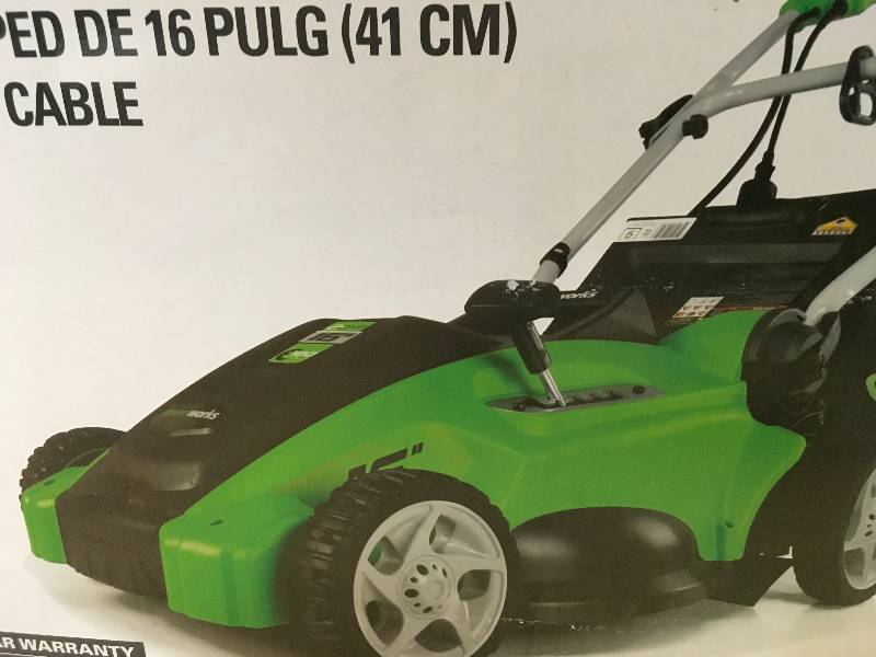 lot 73 image: Greenworks 16 in. 10 Amp Corded Electric Walk Behind Push Mower in working conditions not used