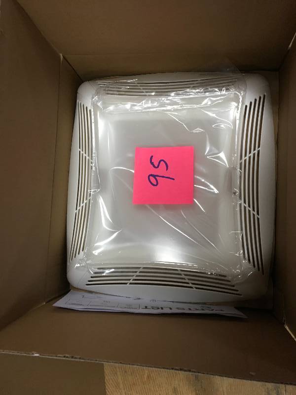 lot 95 image: NuTone 70 CFM Ceiling Exhaust Fan with Light, White Grille and Bulb not used
