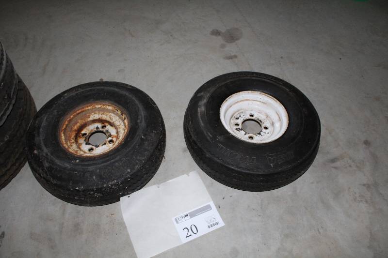 lot 20 image: Lot of (2) Carlisle Trailer Tires Mounted on 4-hole Rims