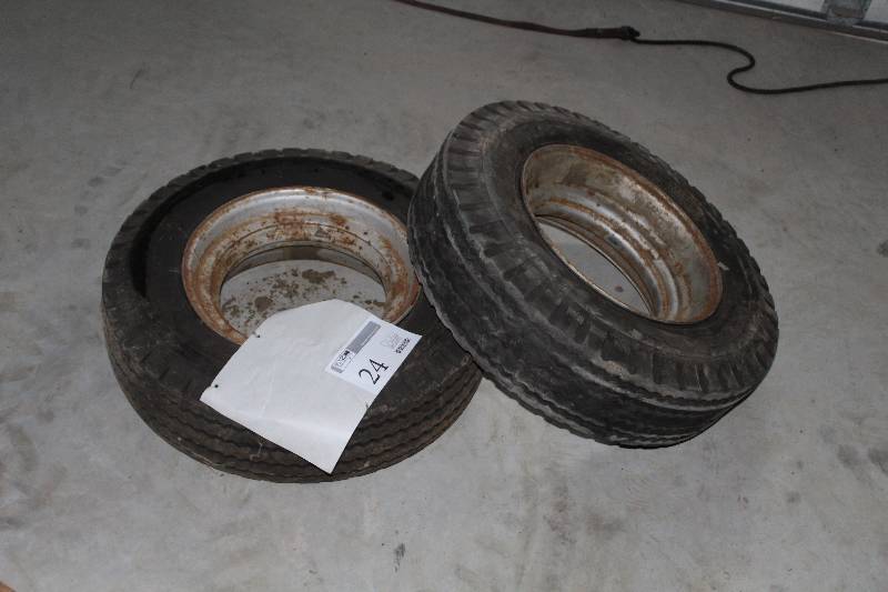 lot 24 image: Lot of (2) 7.50 - 14 8-ply Tires on Equipment Rims
