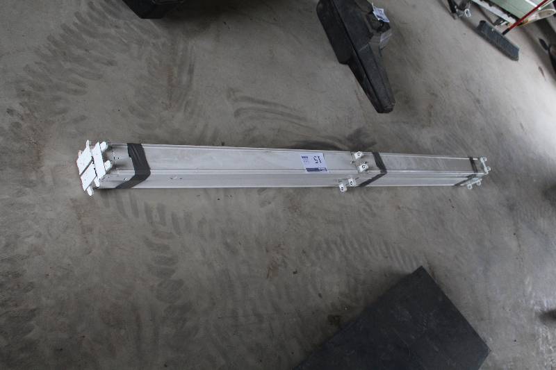 lot 15 image: Lot of (3) 8 ft. long with 4 ft tube florescent light fixtures