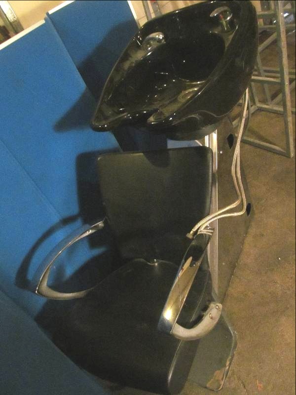 hair stylist salon sink and chair