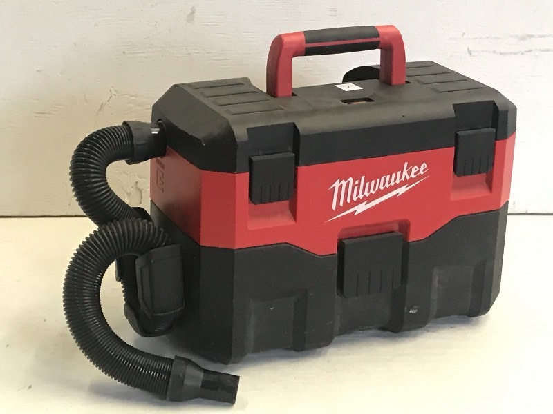 lot 7 image: Milwaukee M18 Cordless WetDry Vac,...