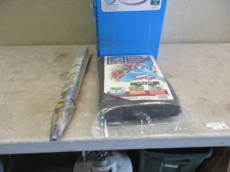 Bird net and tree watering bags
