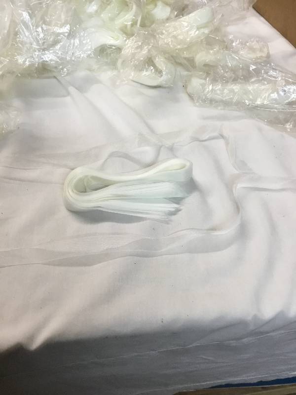 lot 29 image: Weddingbirthdaycraft white satin ribbon 26 long 78 wide