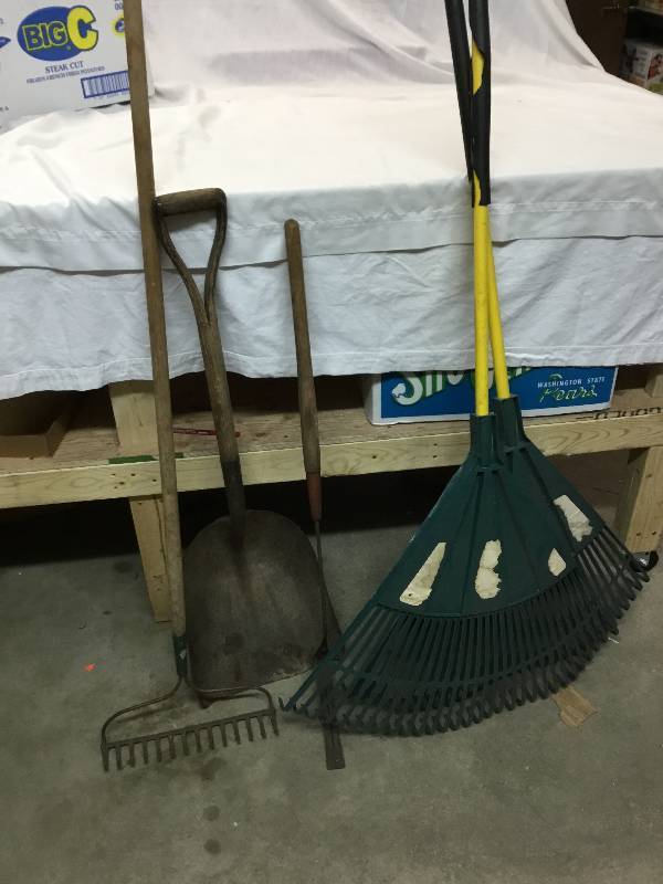 lot 33 image: Hand tools 3 Rakes, Shovel and weedgrass cutter