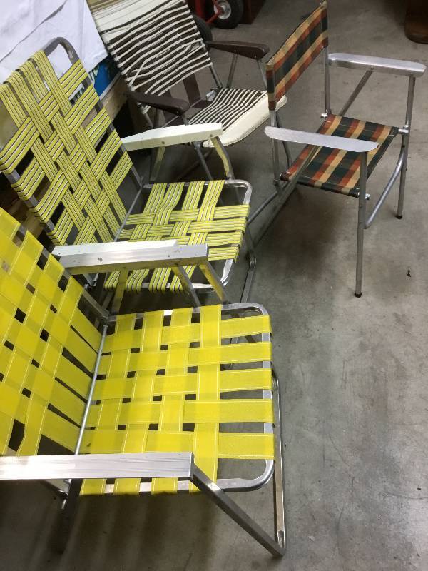 lot 42 image: 4 patio chairs, 2 grills and wheel barrow