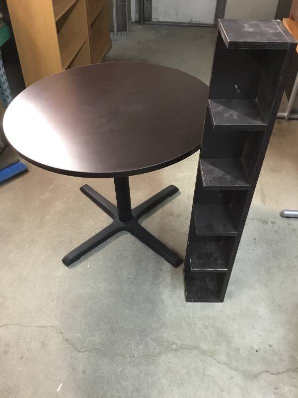 lot 8 image: Round Black table and small Black shelf