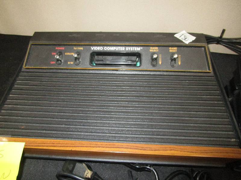 lot 47 image: Atari System, 22 Games and 4 Controllers