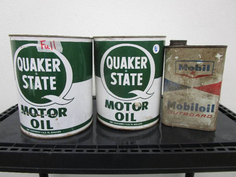 lot 96 image: 2 one gallon cans of Quaker State Oil one full