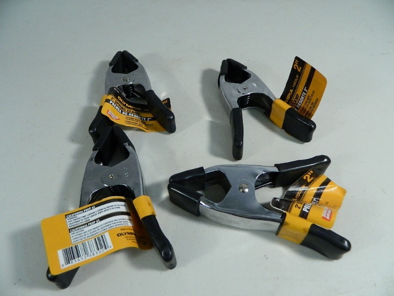 lot 237 image: 4 New Olympia Clamps