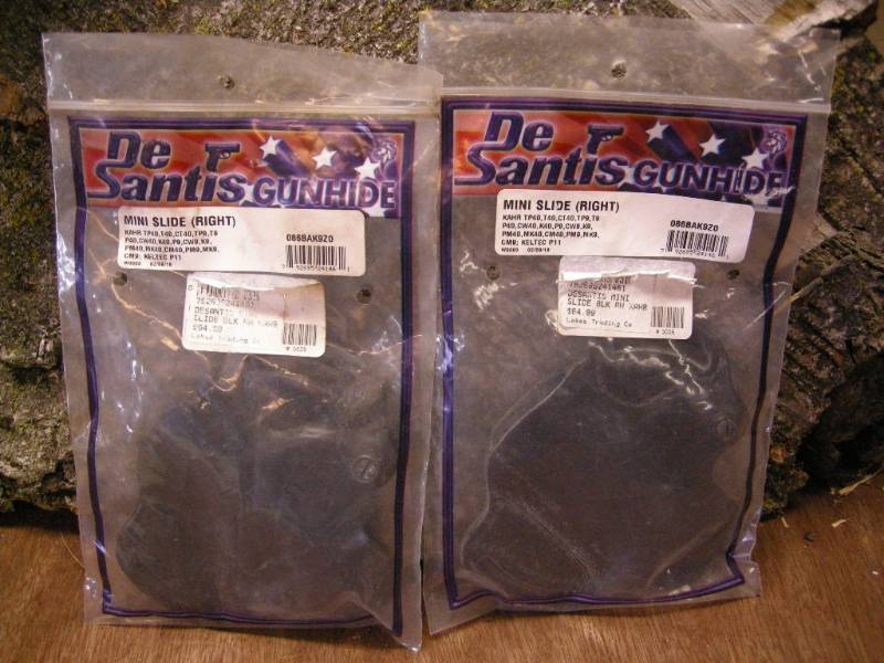 lot 112 image: 2 DeSantis Mini Slide Holsters