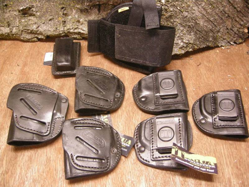 lot 212 image: Misc Tagua Holster Group