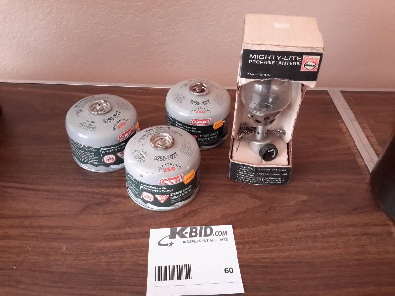 lot 60 image: 1 Mighty Lite Propane Lantern, 3 Propane Refills