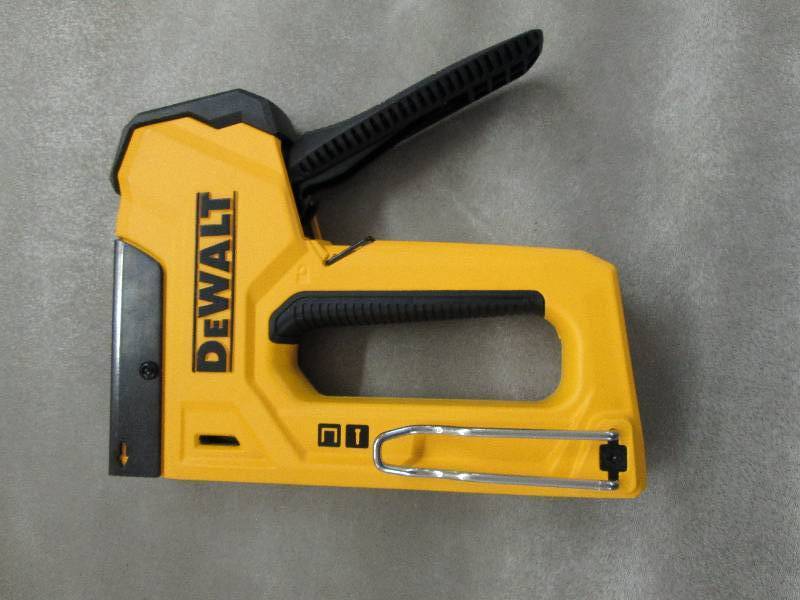 lot 182 image: Dewalt 4 in. Compact Staple Gun ope...