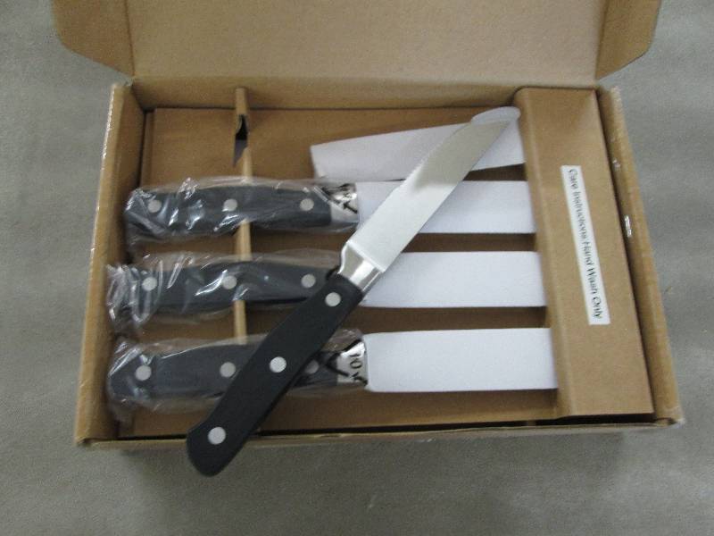 lot 299 image: Amazon Basics 8 piece Premium Steak...