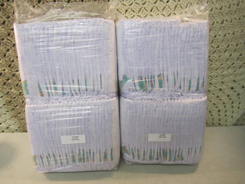 lot 7 image: 100 Size X-Large (32-44 pound) Diap...