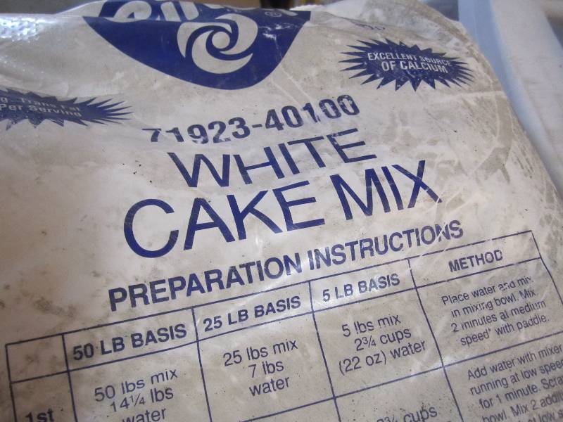 lot 97 image: Bag of White Cake Mix 50 pounds.  B...