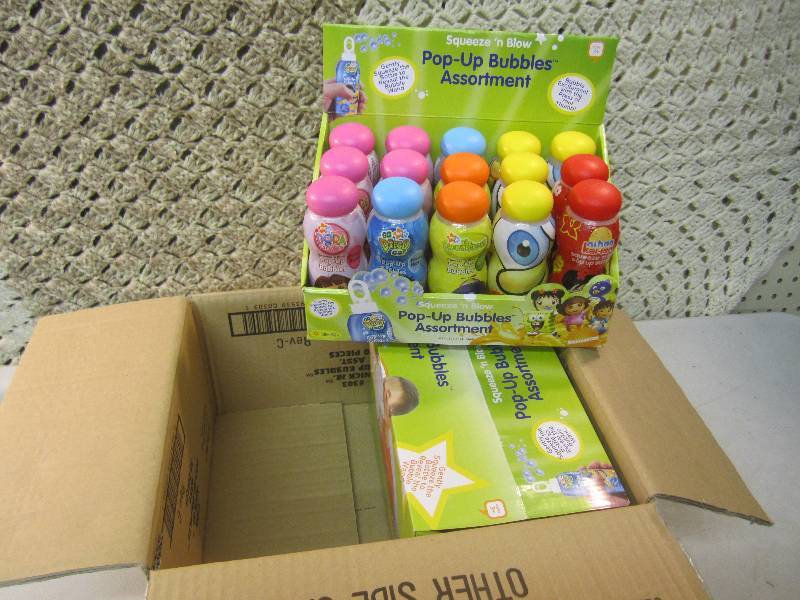 lot 130 image: Case of 30 Squeeze N Blow Pop-Up B...