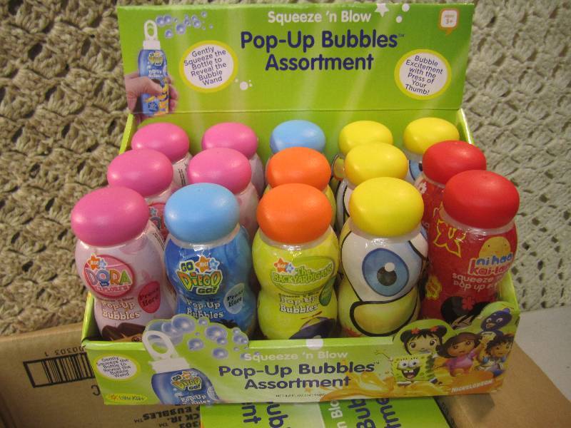 lot 131 image: Case of 30 Squeeze N Blow Pop-Up B...
