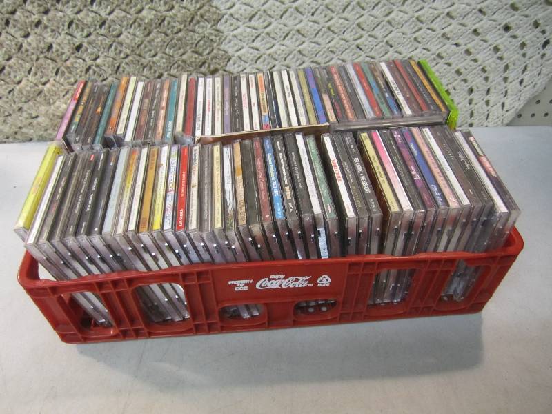 lot 186 image: 80 plus CDs in plastic Coca Cola C...