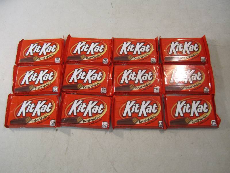 lot 214 image: 12 Kit Kat Candy Bars Best by Sept ...