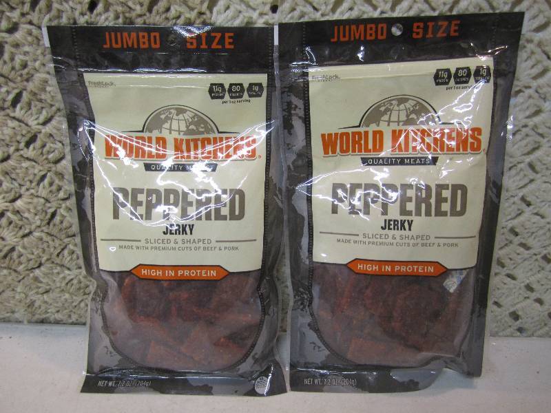 lot 222 image: 2 Bags of Peppered Jerky Best by Ju...