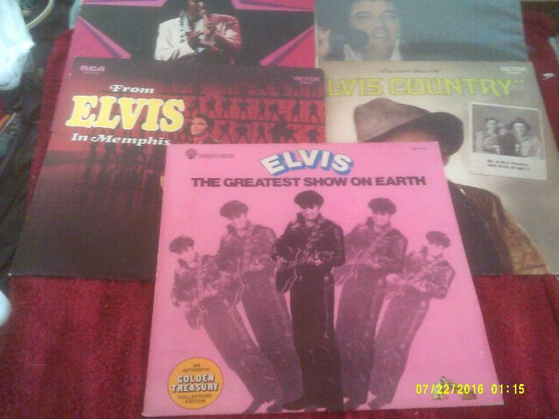 lot 61 image: 7 COLLECTIBLE ELVIS RECORDS