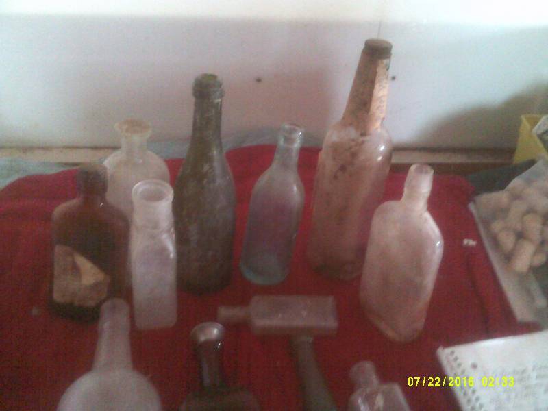 lot 75 image: ANTIQUE BOTTLES