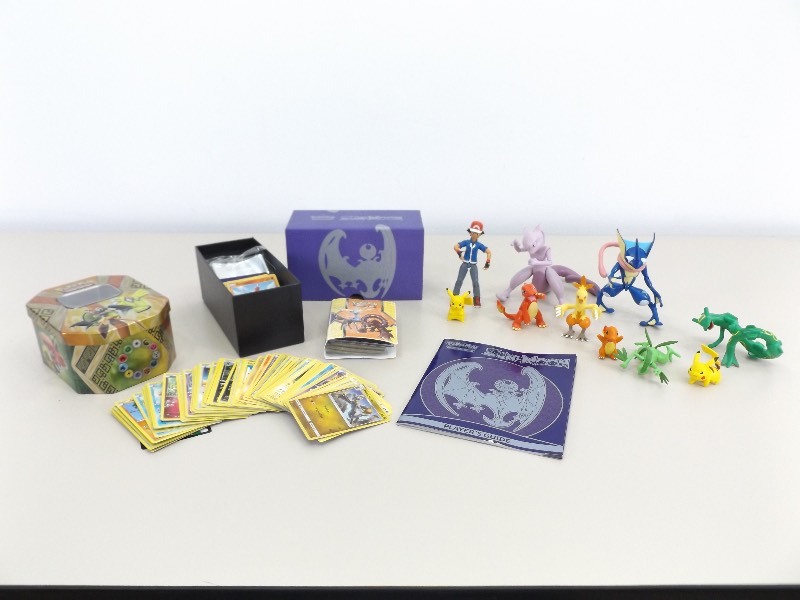 lot 17 image: Collection of Pokemon Cards and Figures